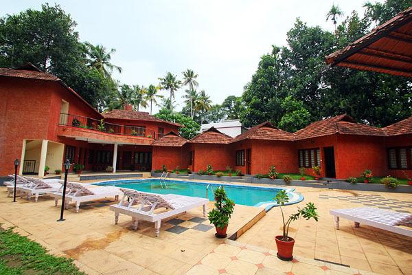 Swimming in Deshadan Cliff And Beach Resort, Varkala