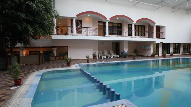 Swimming in Hotel Country Inn Bhimtal